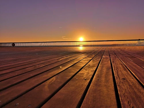 Quiet day at the beach. Beautiful Sunset at the pier.